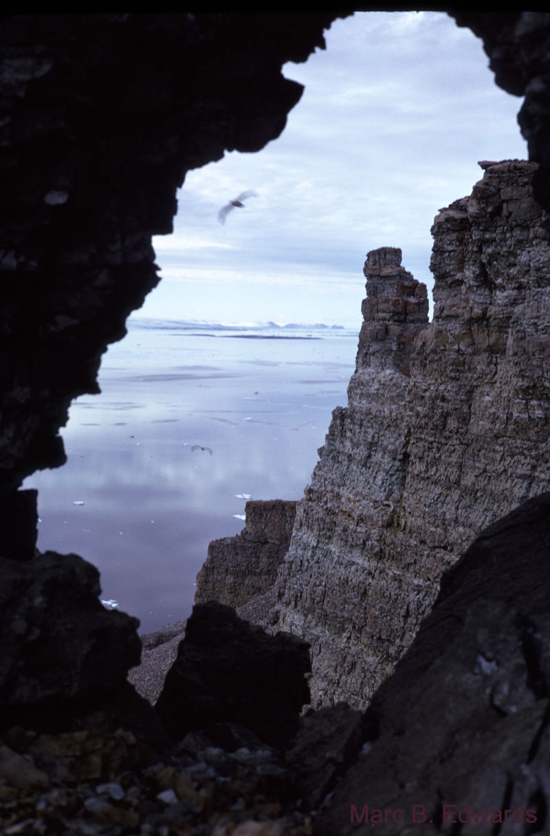 Cave in Permian cherts, Palanderbuktet, Nordaustlandet, Svalbard.